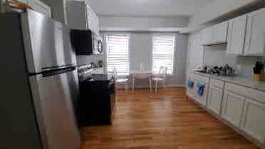 Large room furnished with utilities