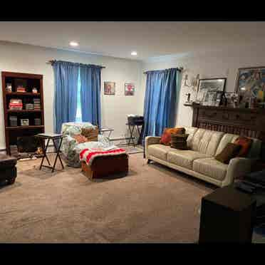 One bedroom in a Stony Brook Home