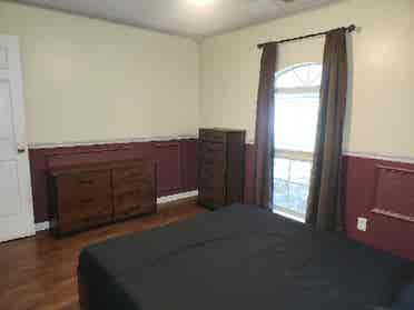 Furnished bedroom with utilities