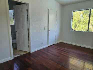 I am renting two rooms in Corona,