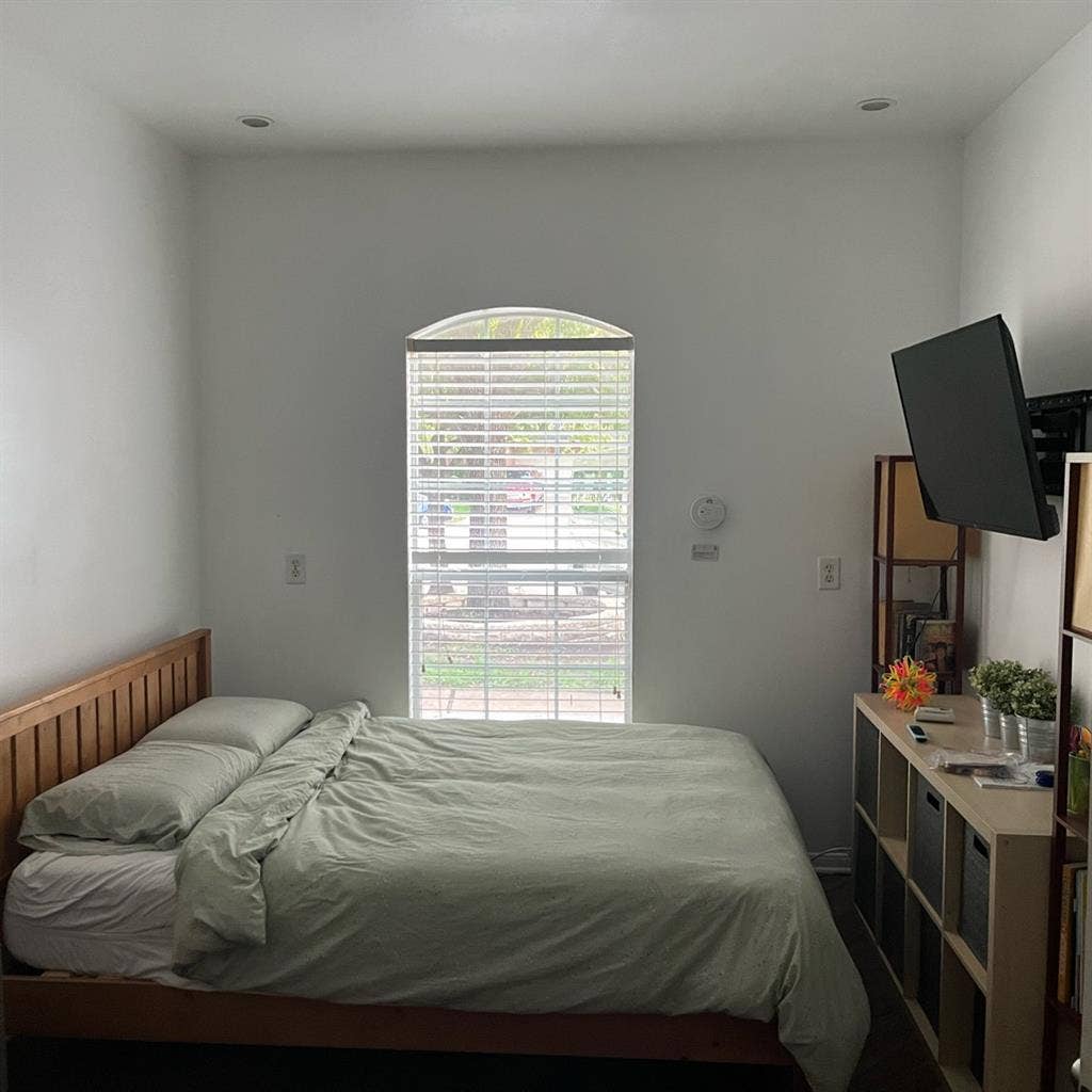 Bedroom with shared bathroom