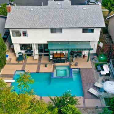 Luxury pool villa drive among hills