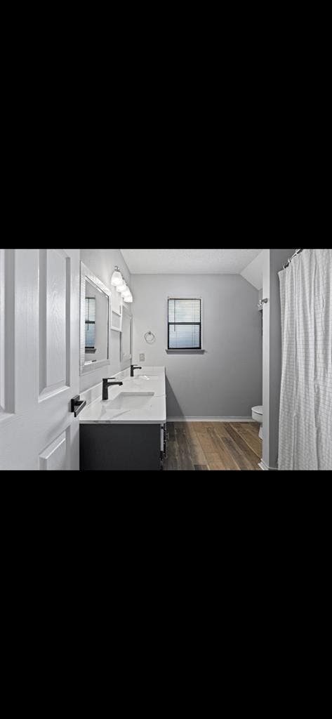 Furnished bedroom with queen bed