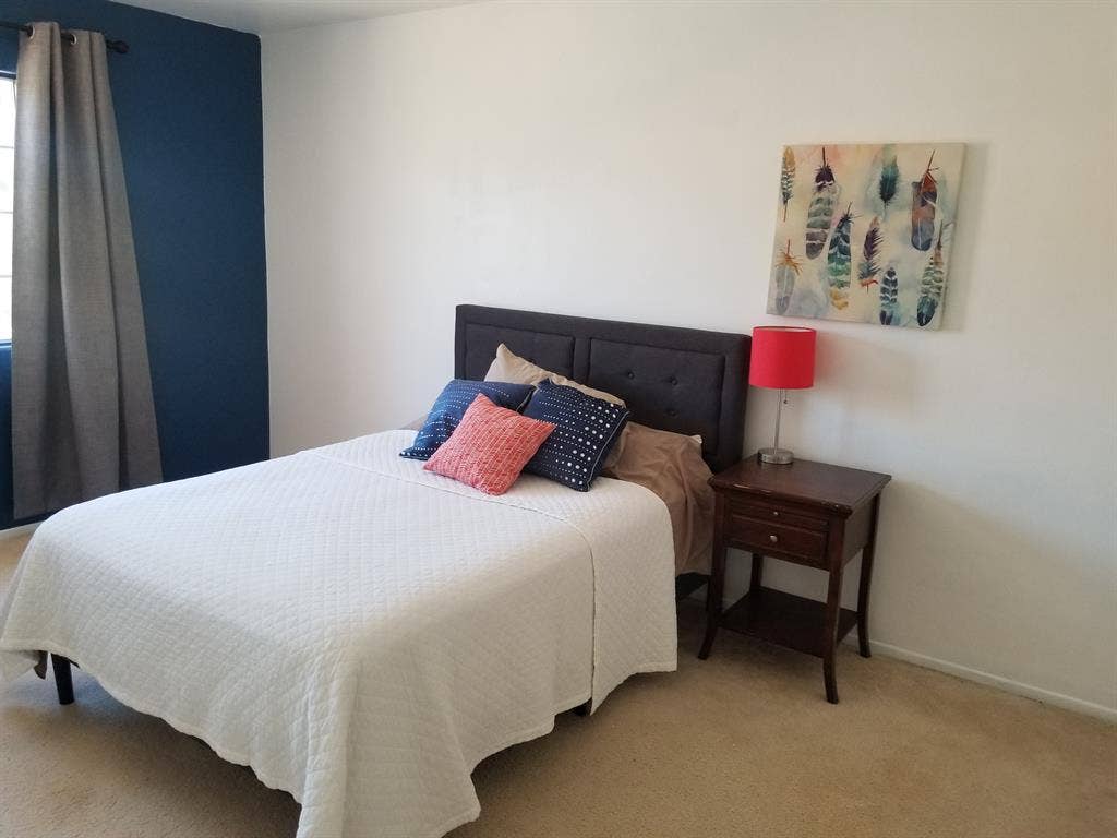 Furnished bedroom w/ walk-in closet