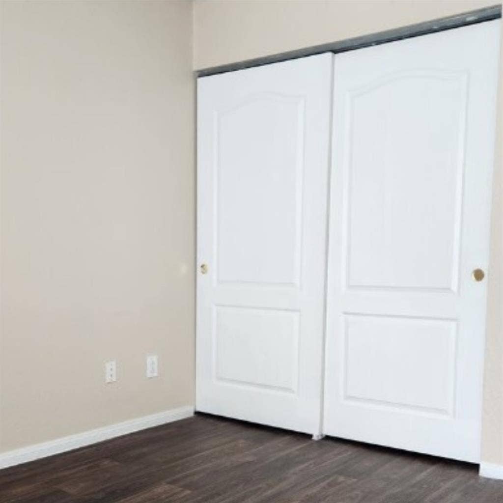 Bedroom with shared bathroom