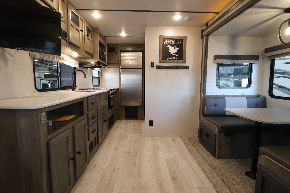 BRAND NEW CAMPER UTILITIES INCLUDED