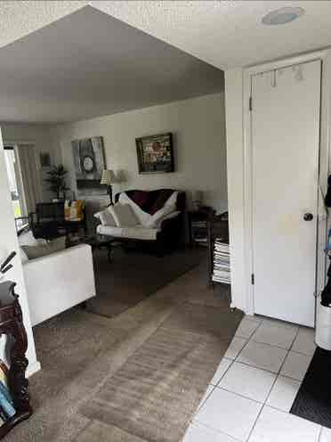 Great room in wooded condominium