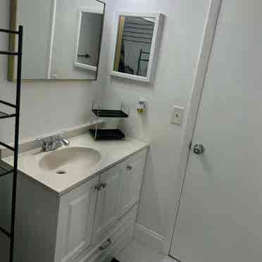 Furnished room with shared bathroom