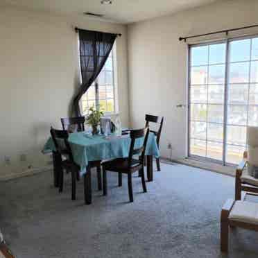 Furnished bedroom shared bathroom