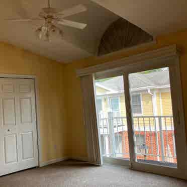 Large sunny master bedroom