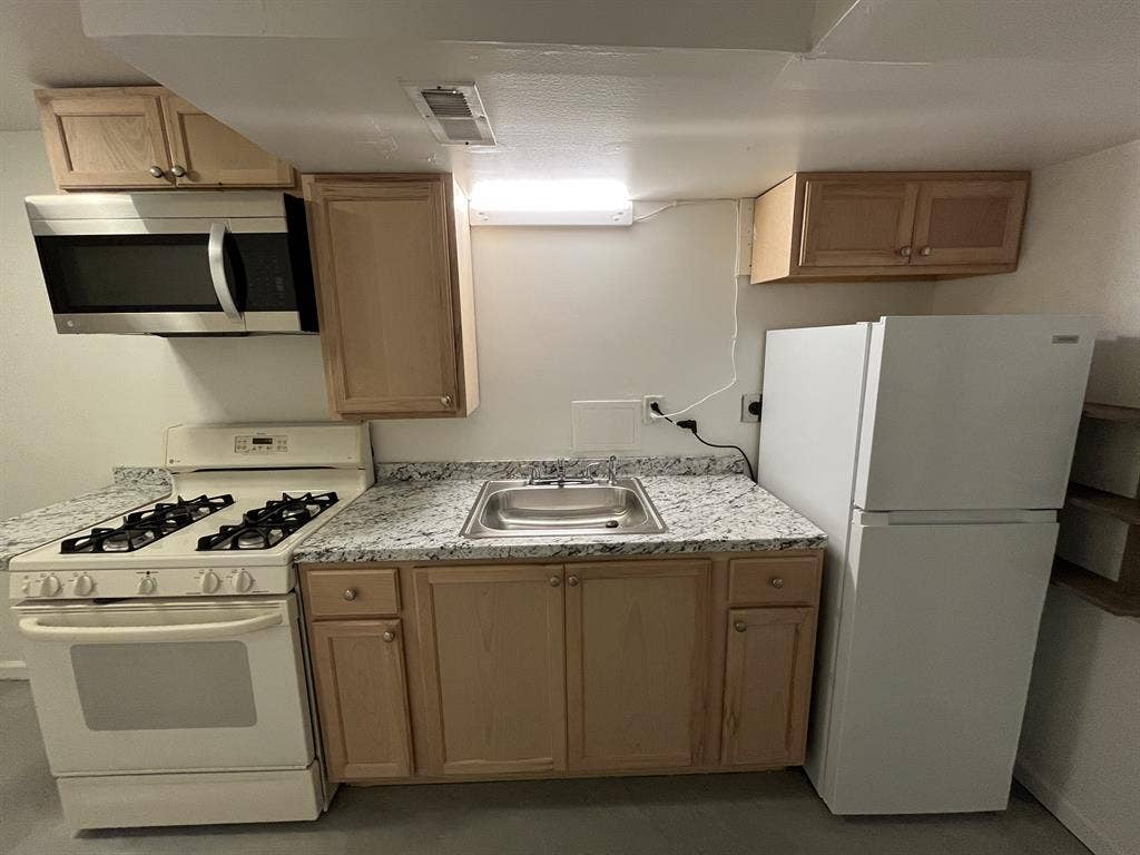 Secured room in basement w/kitchene