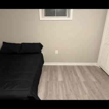 Large fully furnished bedroom.