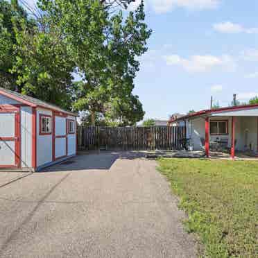 Share house on large lot.