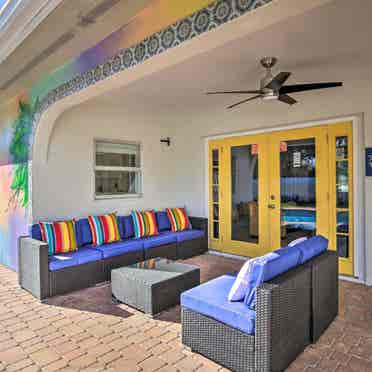 pool home oasis with fire pit.