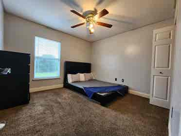 Bedroom with shared bathroom