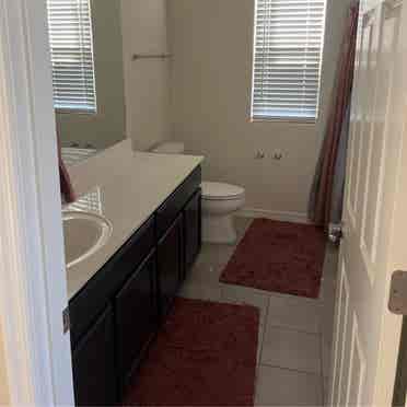 Room and bathroom in mesa townhouse