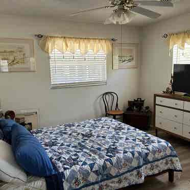 Nice bedroom with closet & tv