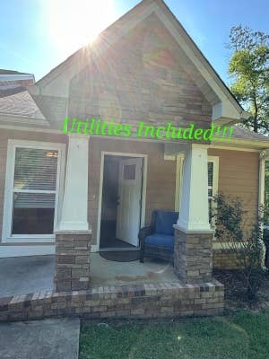 Utilities included/ Screened porch