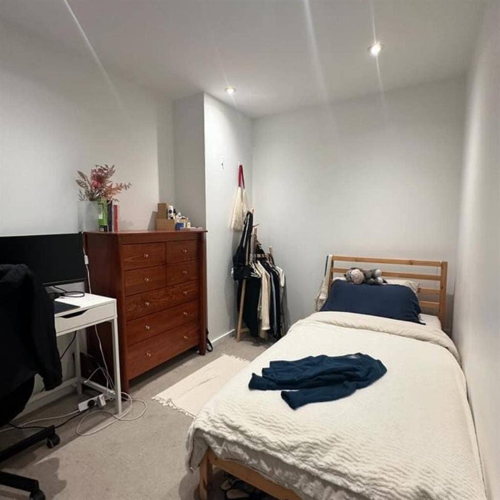 Bedroom in iconic apartment in cbd