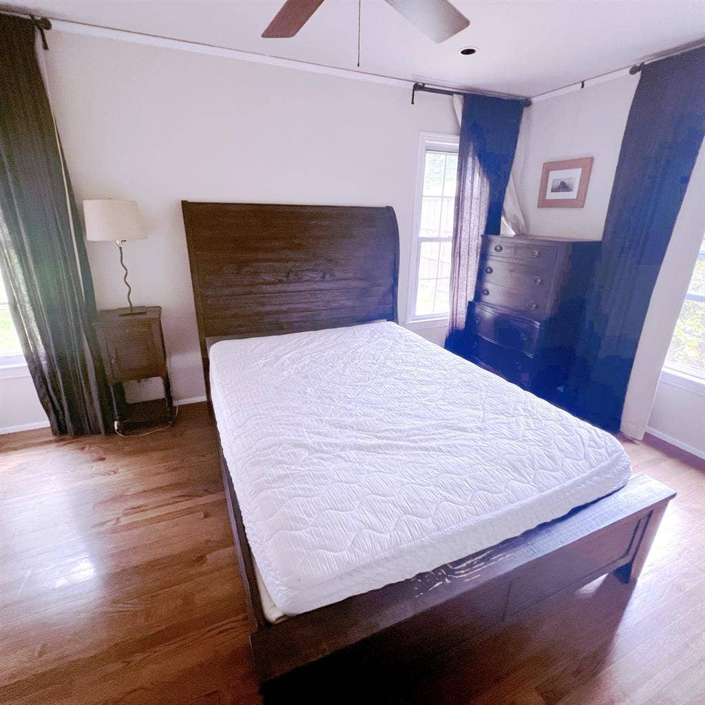 A master bedroom in nice community