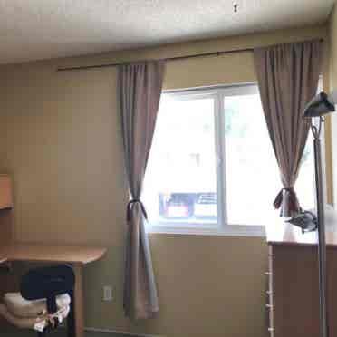 Large bedroom, den, utilities inc.