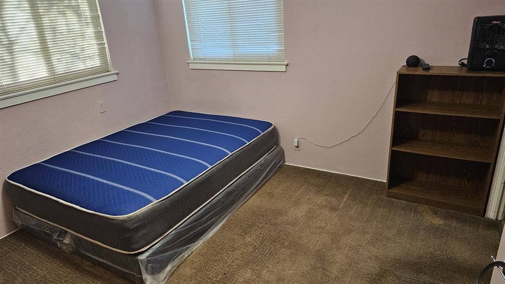 Master bedroom with attached bath.