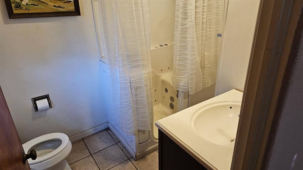 Master bedroom with attached bath.