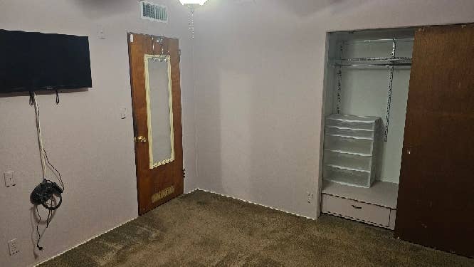 Master bedroom with attached bath.