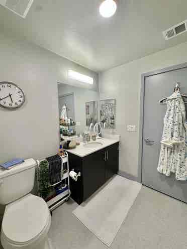 Topaz Apartments Room and Bathroom