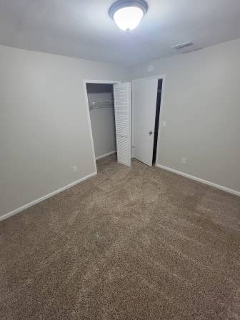 Bedroom with shared bathroom