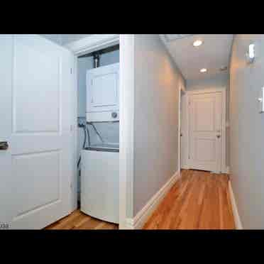 Room with in-
unit washer and dryer.