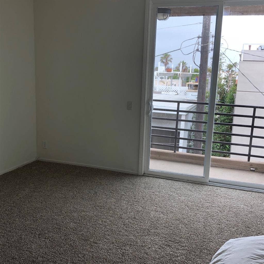 Large bright bedroom by beach