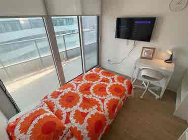 Bright Bedroom in Vibrant Downtown