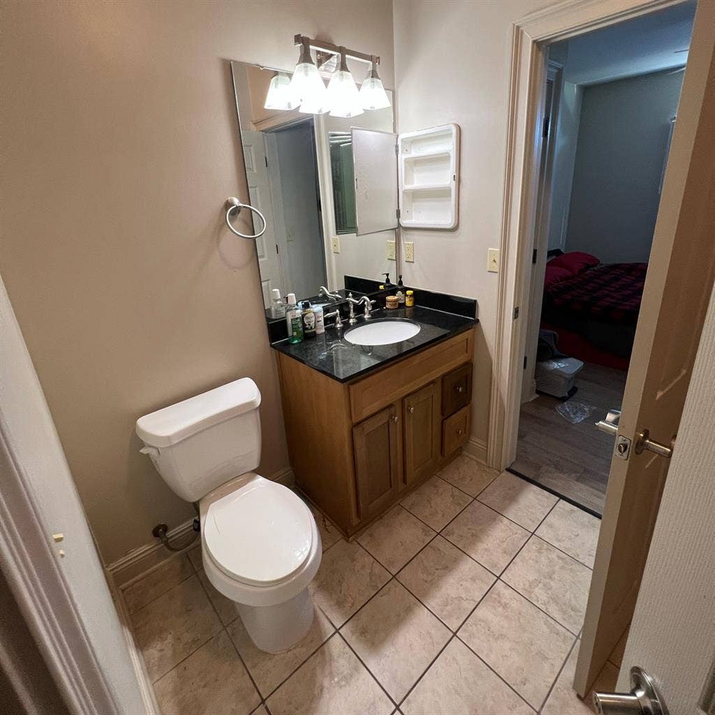 Room with connected bathroom