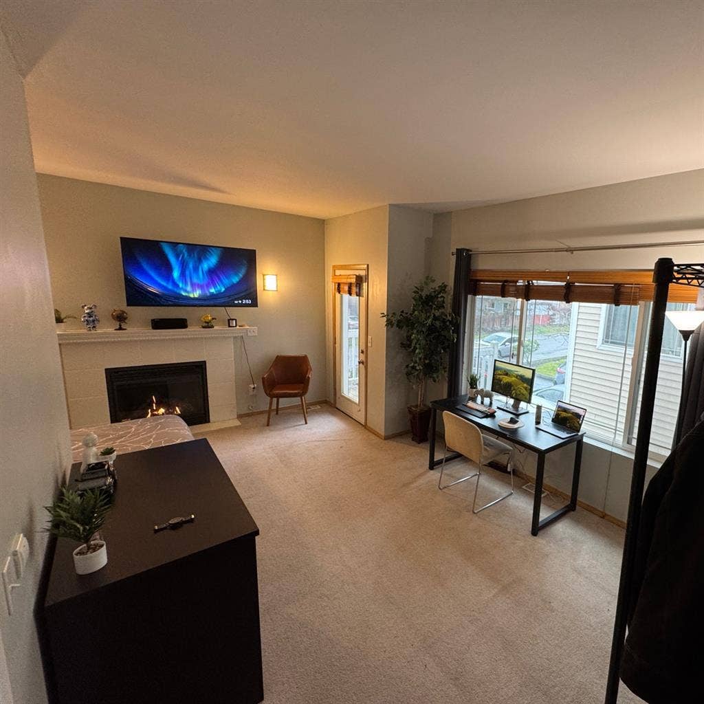 Bedroom with Balcony & Fireplace