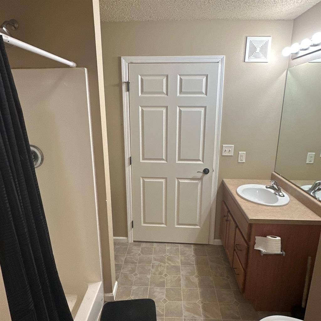 1 bedroom with bathroom attached.