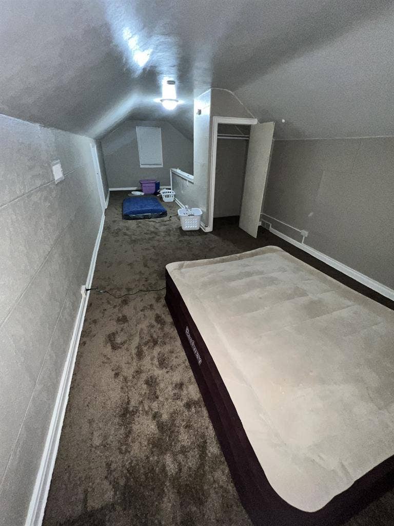 Huge carpeted attic room