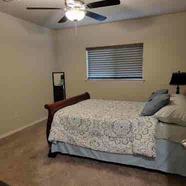 Bedroom with shared full bathroom