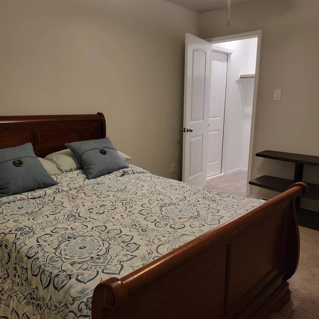 Bedroom with shared full bathroom