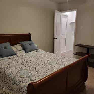 Bedroom with shared full bathroom