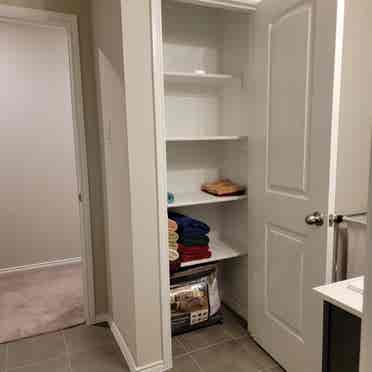 Bedroom with shared full bathroom