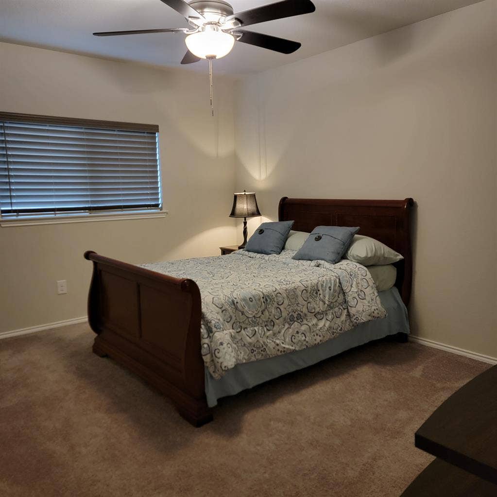 Bedroom with shared full bathroom