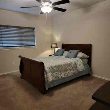 Bedroom with shared full bathroom