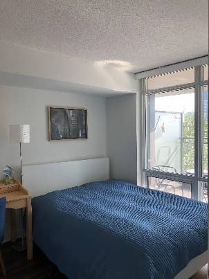 Separate bedroom with windows