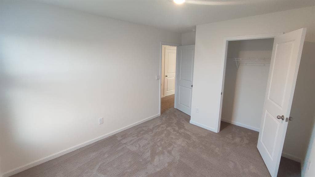 Bedroom with shared bathroom