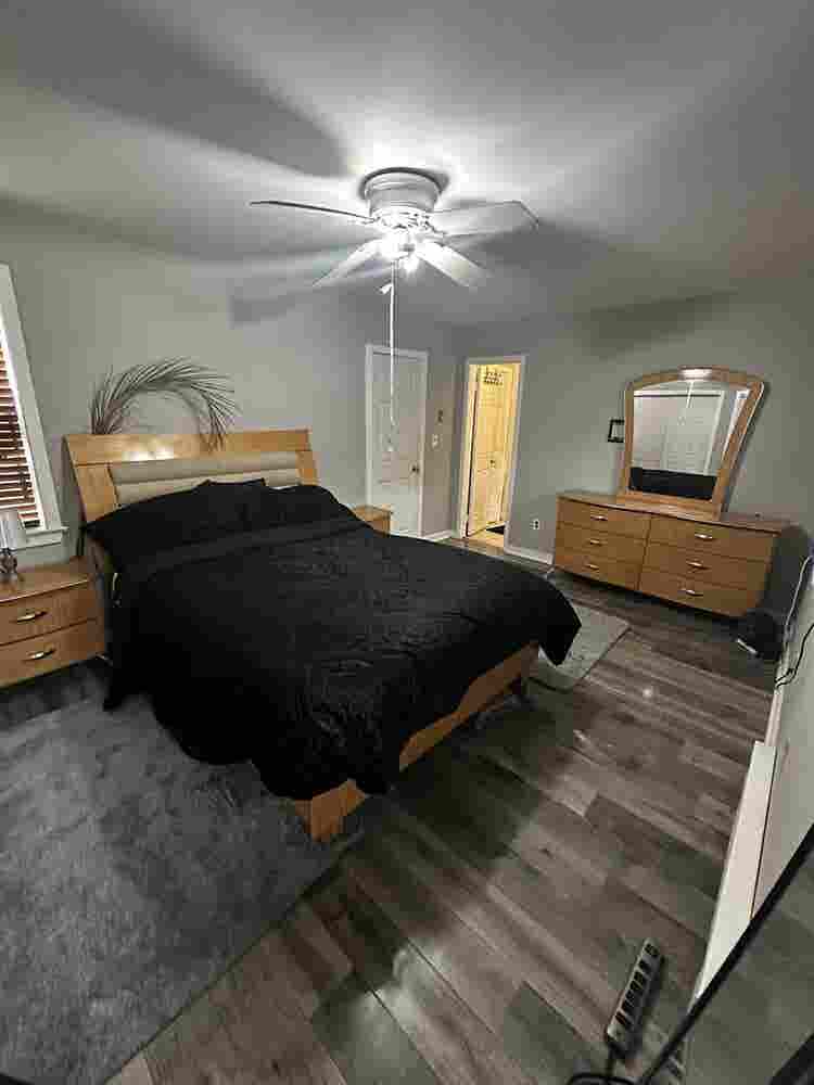 Large furnished room with bathroom