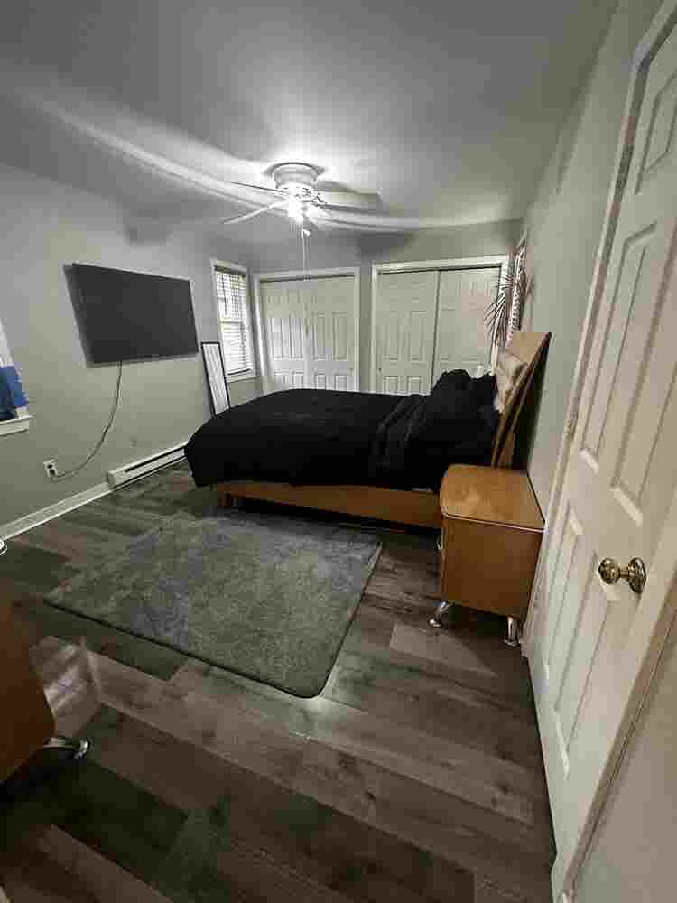 Large furnished room with bathroom