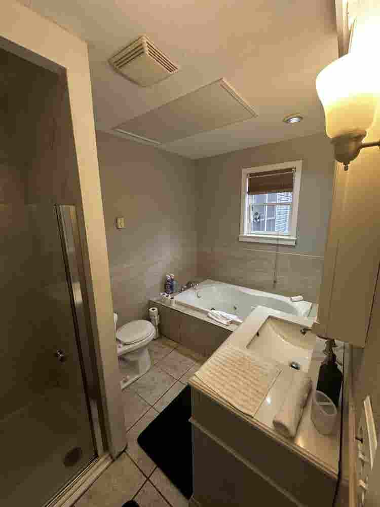 Large furnished room with bathroom