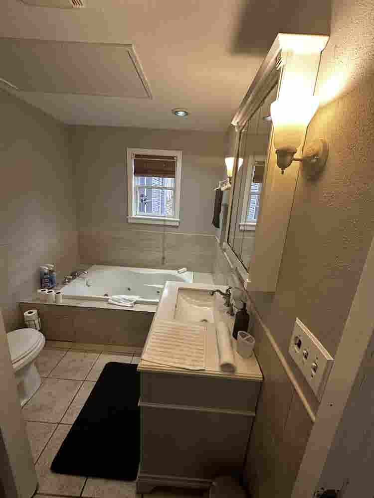 Large furnished room with bathroom