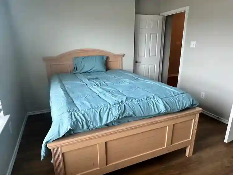 Furnished Bedroom w/ 2 Big windows.